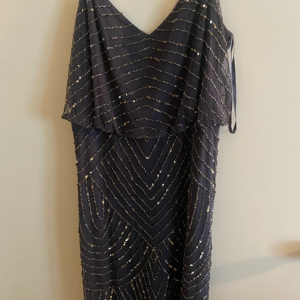 Worn once for a wedding - in fantastic condition